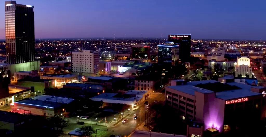 33 Fun &Amp; Unique Things To Do In Amarillo – 2025 32 Nighttime aerial view of a city skyline.