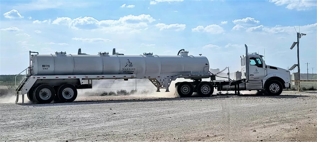 Gate Guarding: Work Camping Jobs For Full-Time Rvers 2024 9 White 18 wheeler water truck.