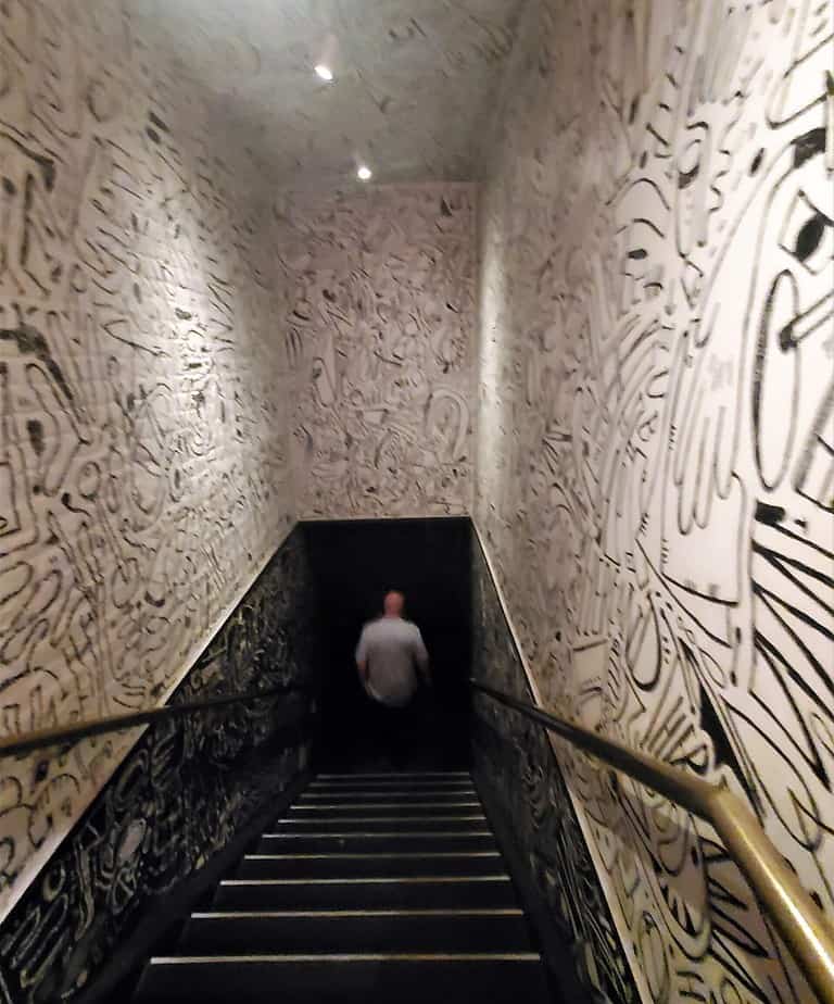 Speakeasies like here nor there have hidden entrances and secret stairwells.