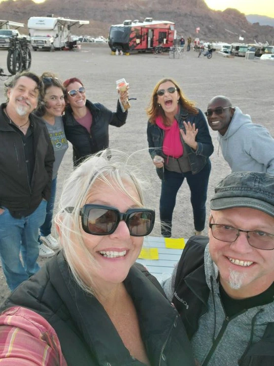 Full-Time Rv Living For Beginners: Start Here! 17 Group of people at a party in the desert.