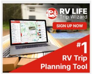 Is Crystal River Worth Visiting In 2025 10 Advertisement for rv life trip wizard featuring a laptop with a trip planning map on the screen, placed on a yellow and white striped cloth with an rv in the blurred background. A red call-to-action button reads 'sign up now' alongside text proclaiming it as the '#1 rv trip planning tool'.