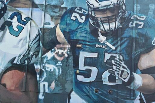 Best Campgrounds Near Philadelphia, Pa For 2025 28 Mural of philadelphia eagles football players in dynamic action poses, with bold blues and greens dominating the artwork, celebrating the spirit of the team and its fans.