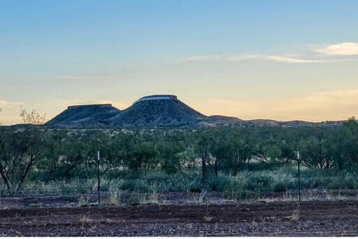 17 Weird Things To Do In Amarillo (2025) 18 Illusionary “floating mesa” near amarillo, where a white strip makes the top look detached—one of the weird things to do in amarillo.
