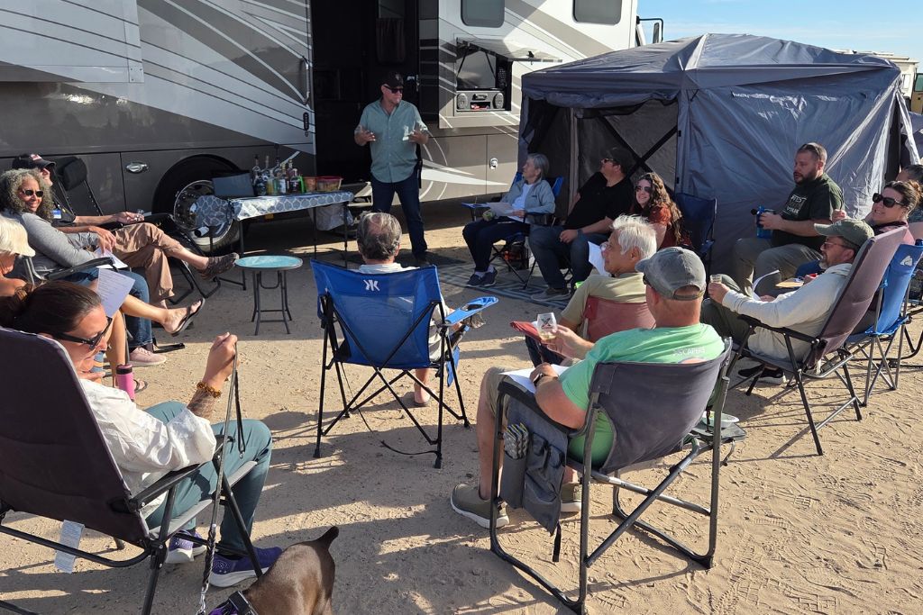 Rv community gathering outside motorhome showing real full time rv life for beginners