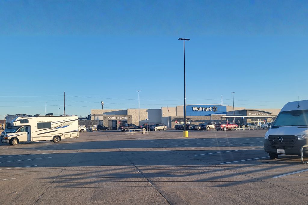 Rv parked overnight in walmart parking lot showing where rvers can stay during road trips
