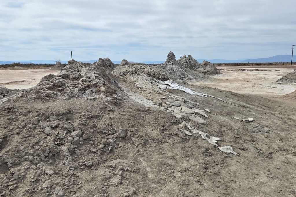 Visiting The Salton Sea: California’s Strangest Desert Lake 9 Bubbling mud volcano formations in the barren desert landscape near the salton sea in california.