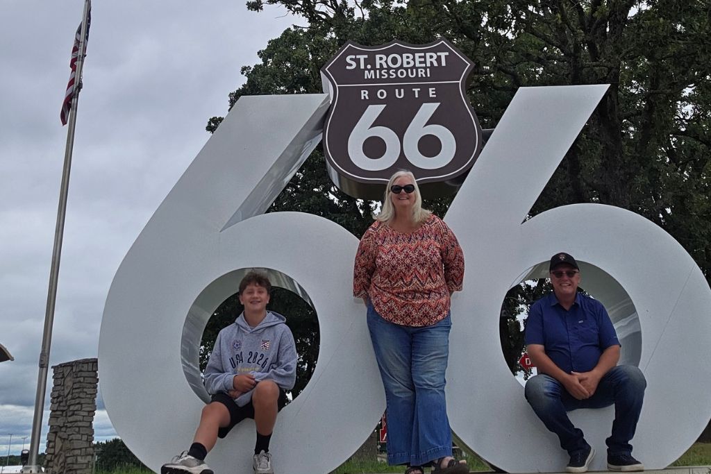 Missouri Road Trip Itinerary: Branson, The Ozarks &Amp; Beyond 28 Mason sits inside one six while his grandmother maureen stands between the numbers and his grandfather robb sits inside the second six of a giant route 66 sign in st. Robert missouri. The roadside stop captures the fun of grandparents sharing new experiences with their grandson.
