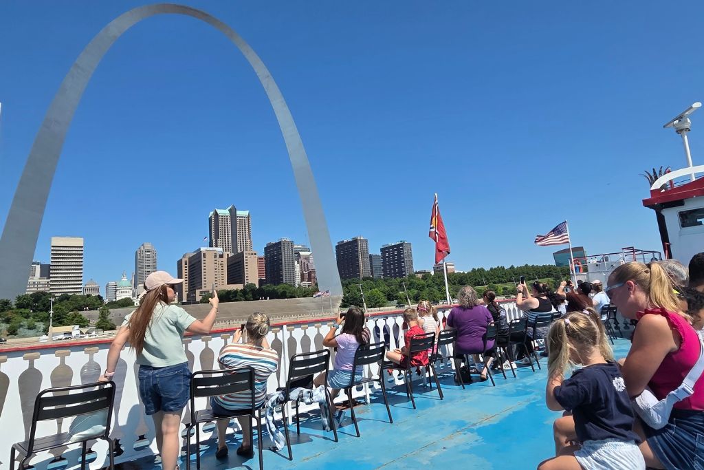 Missouri Road Trip Itinerary: Branson, The Ozarks &Amp; Beyond 7 Passengers view the gateway arch from a mississippi river cruise in st. Louis.