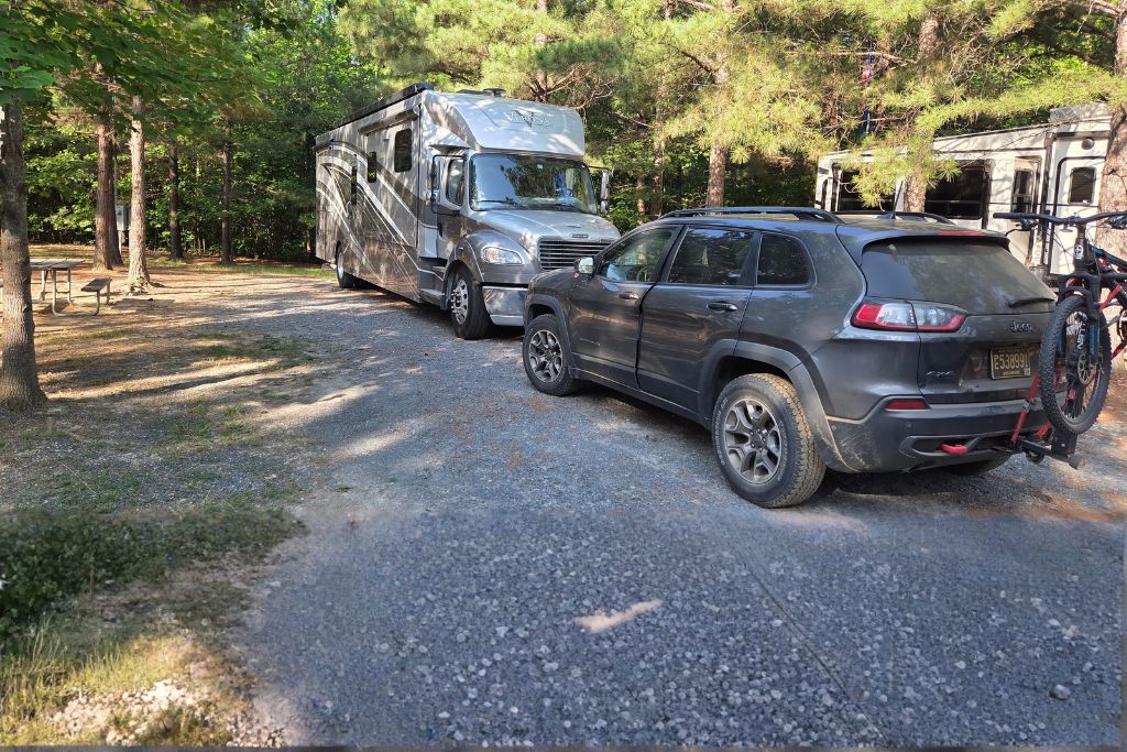 Missouri Road Trip Itinerary: Branson, The Ozarks &Amp; Beyond 26 A 40 foot renegade verona motorhome and jeep are parked at a wooded campground. Traveling in a big rv requires planning routes campgrounds and fuel stops that can comfortably accommodate the motorhome and tow vehicle.