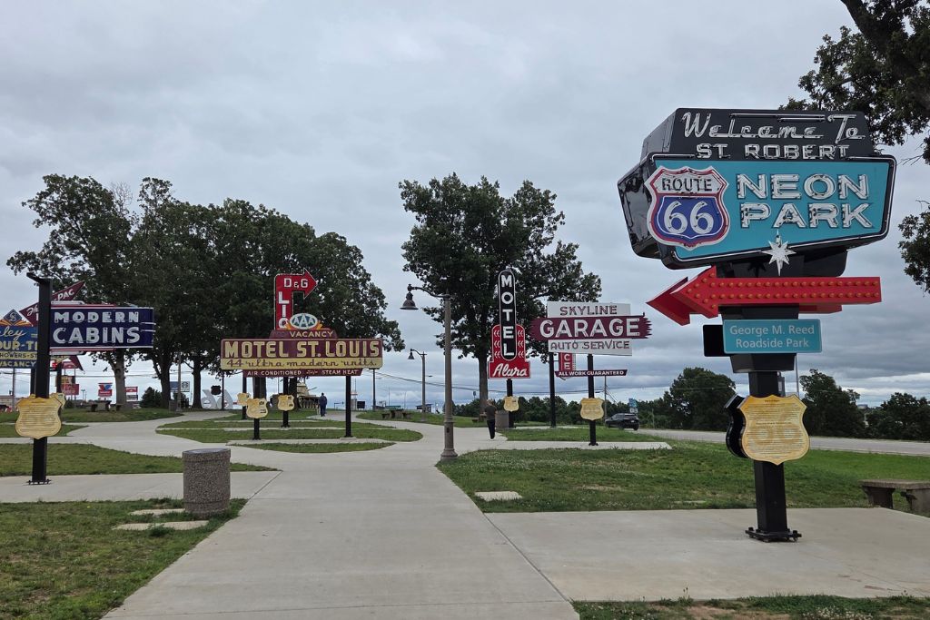 Missouri Road Trip Itinerary: Branson, The Ozarks &Amp; Beyond 15 Historic route 66 neon signs on display at st. Robert neon park after a rainy day near lake of the ozarks.