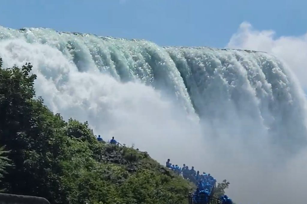Is Niagara Falls Worth Visiting? What We Think After Several Visits 1 : american falls thunders over the cliff as mist rises around visitors in blue ponchos below. The maid of the mist viewing platform gives visitors an up close look at the power of niagara falls even during a shorter visit.