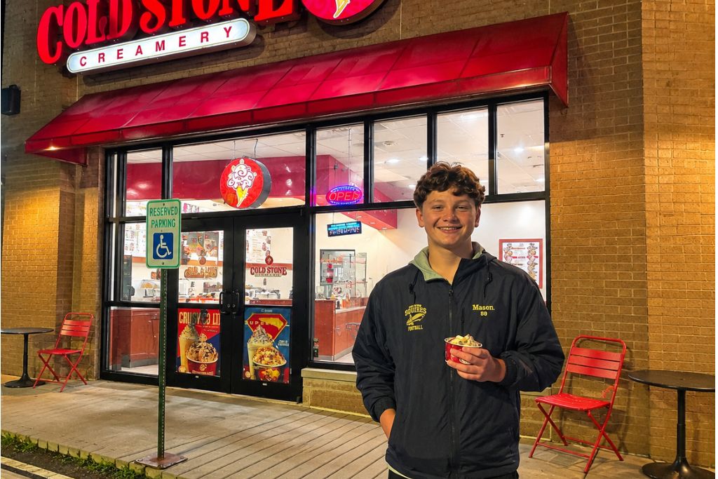 Is Branson Worth Visiting? Our Thoughts After Three Days 5 Mason enjoys a cup of ice cream outside cold stone creamery in branson after a day of exploring the city. Ending each evening with a sweet treat became one of our favorite family traditions during our branson trip.