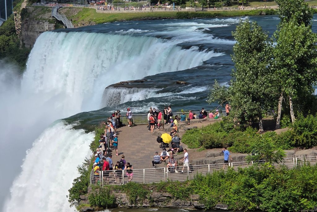 Is Niagara Falls Worth Visiting? What We Think After Several Visits 4 American falls and bridal veil falls rush past luna island as visitors gather on the viewing platform between the two waterfalls. Seen from stedmans bluff the overlook shows just how close visitors can get to the water on the american side of niagara falls.