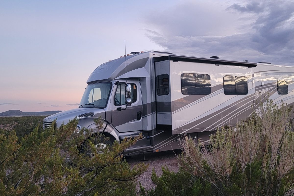 Rv parked at dusk on a scenic overlook